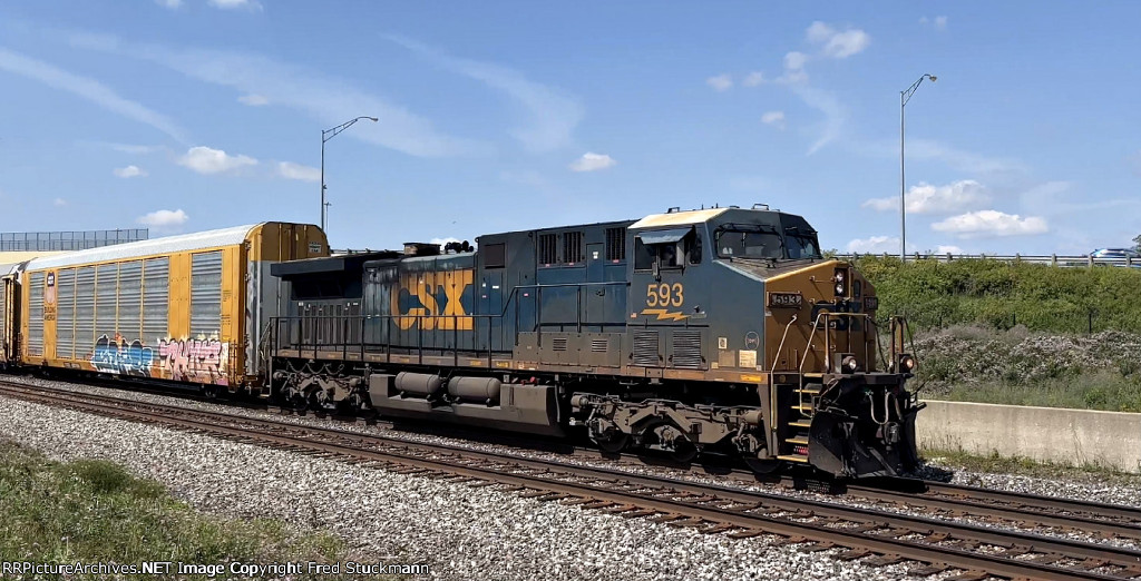 CSX 593 leads another M214.